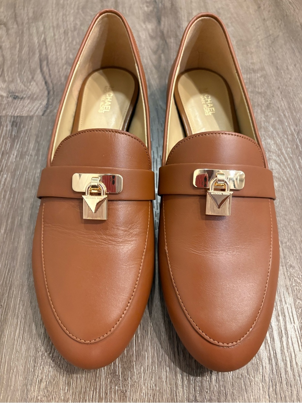 Michael Kors women’s Tan Leather Loafers with Gold Hardware
